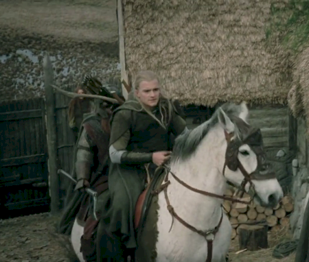 Legolas and Gimli riding upon Arod.